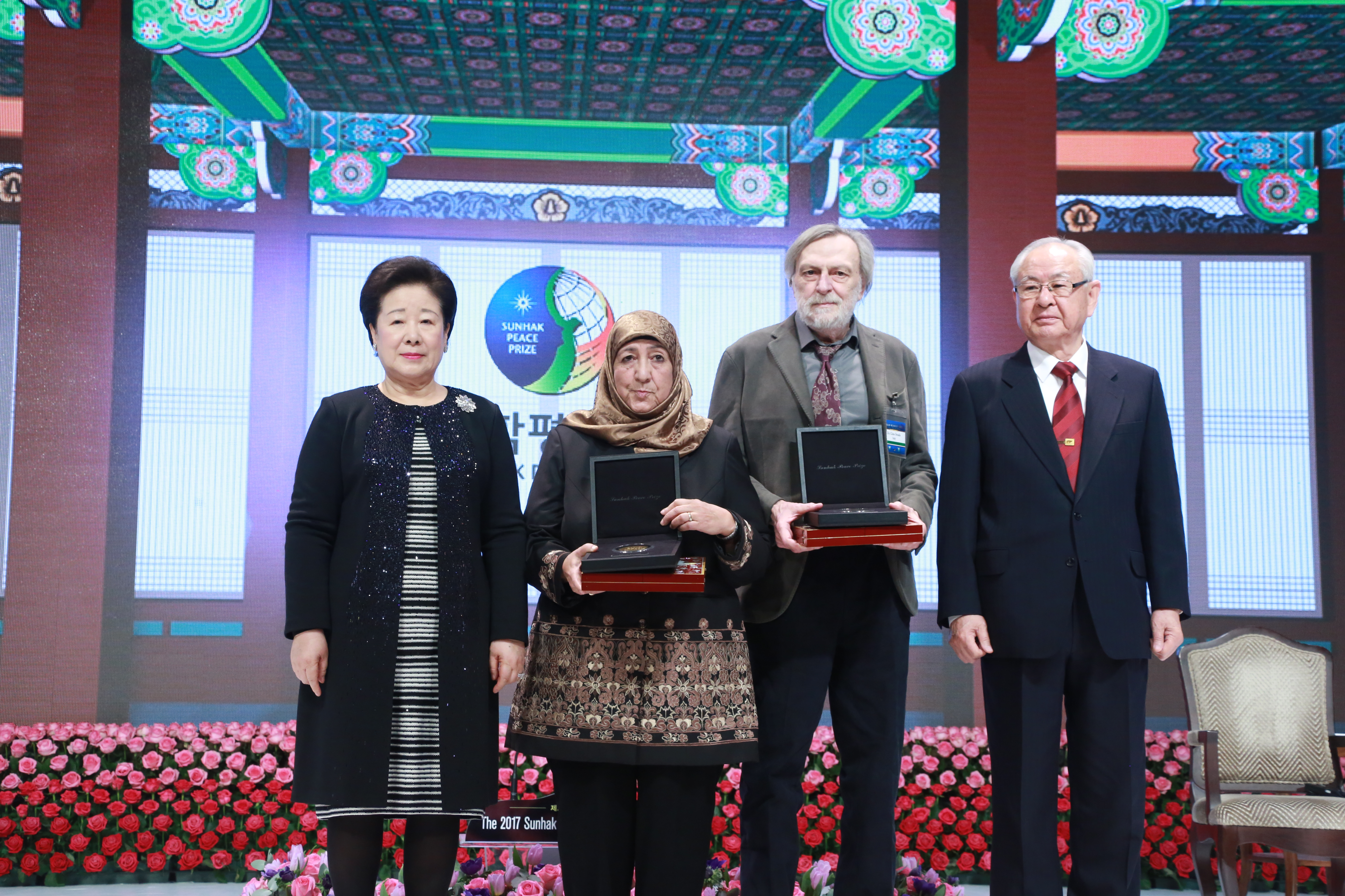 Awarding Of Medal And Plaque With Dr. Hak Ja Han Moon Founder Of Sunhak Peace Prize And Dr. Il Sik Hong Sunhak Peace Prize Committee Chairma
