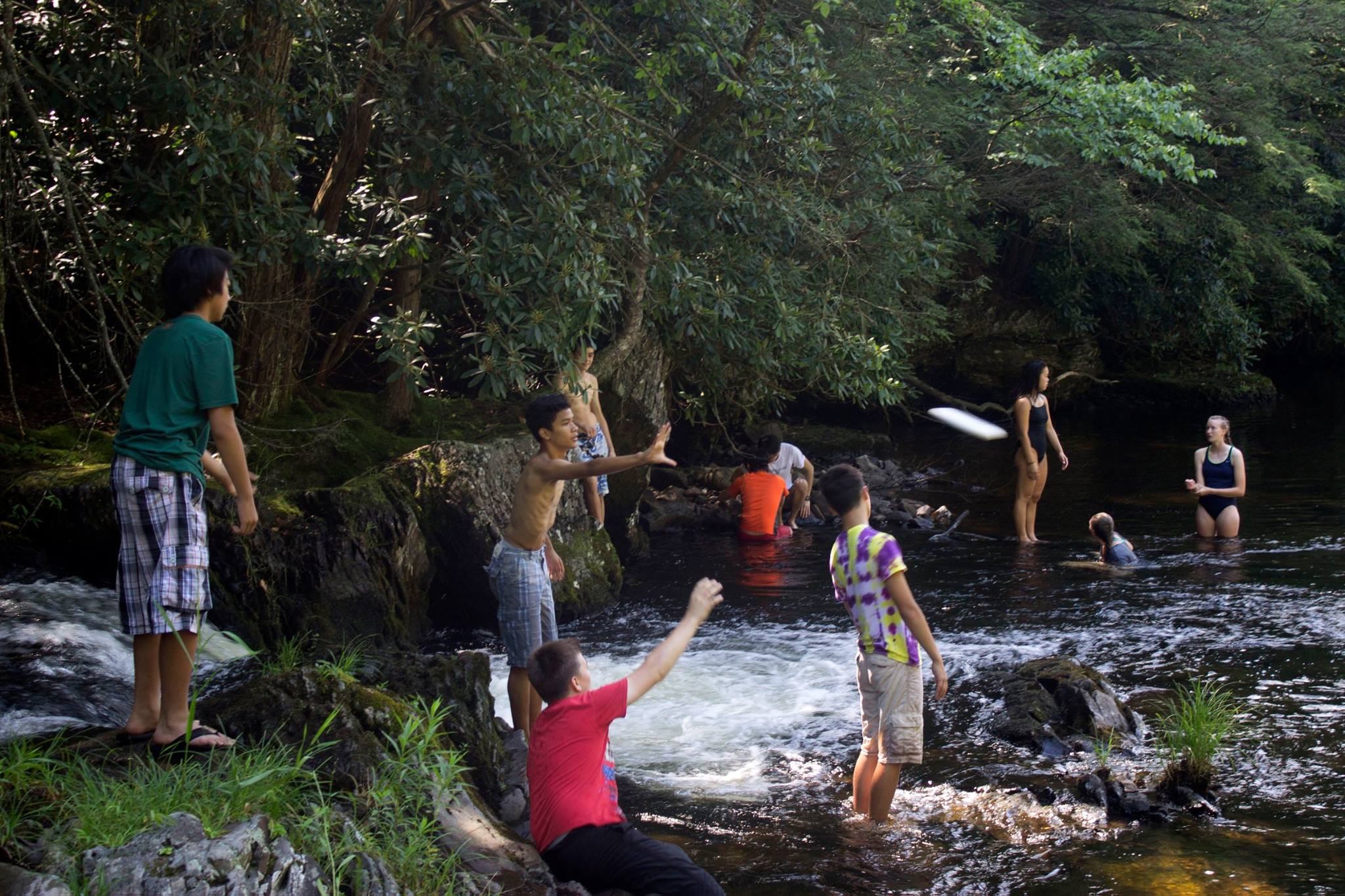 swimming at waterfall